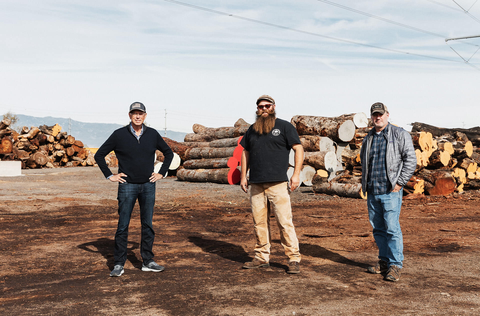 Taylor Guitars staff at a lumber yard